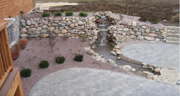 Water feature installation for Mequon and Milwaukee County homes 