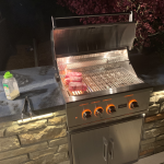 Outdoor Kitchen Grill at Night
