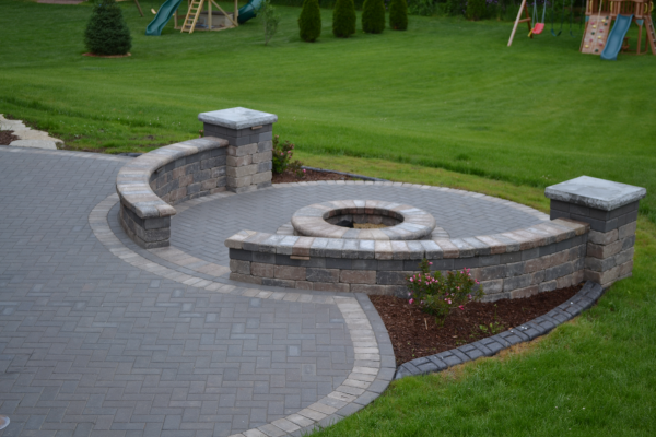 Rounded Stone Brick Patio with Fire Pit