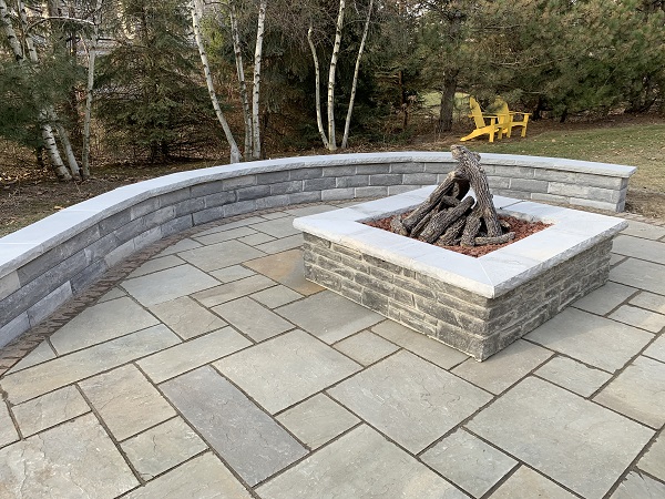 upgrade your paver patio with fire pit and seating wall installation services in Mequon, Milwaukee, and beyond 