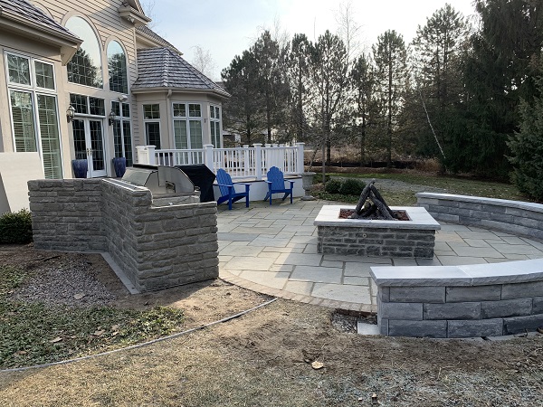 Seating walls for outdoor living spaces, installed and designed for Milwaukee, Mequon, and the surrounding area's homes 