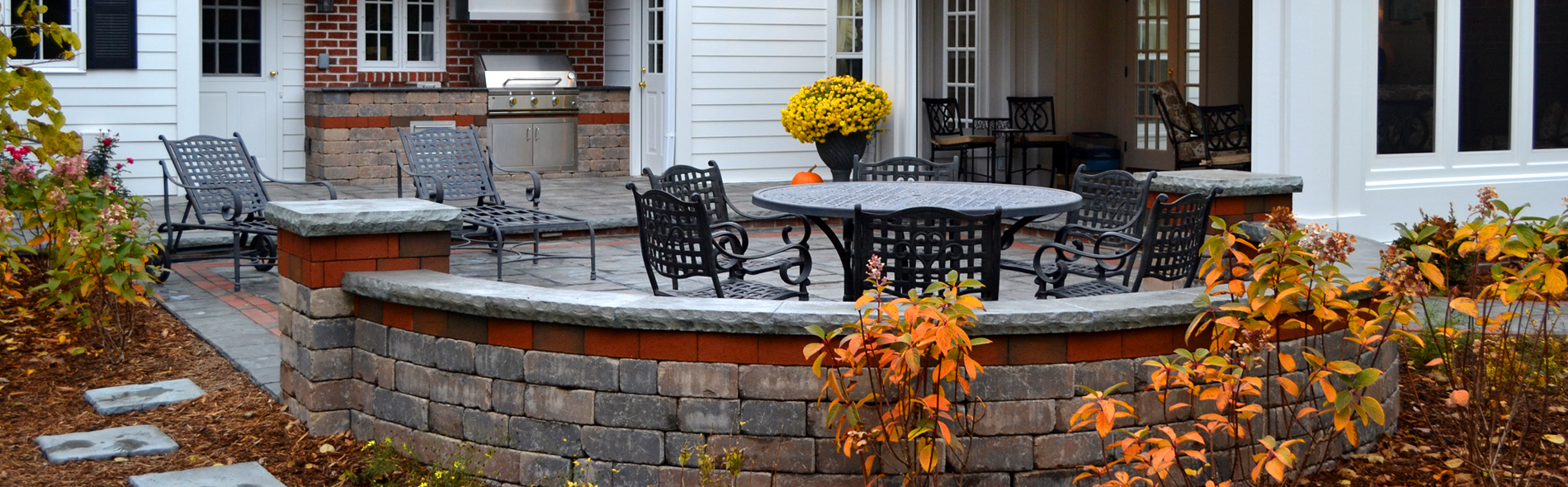 Stone Brick Patio with outdoor kitchen