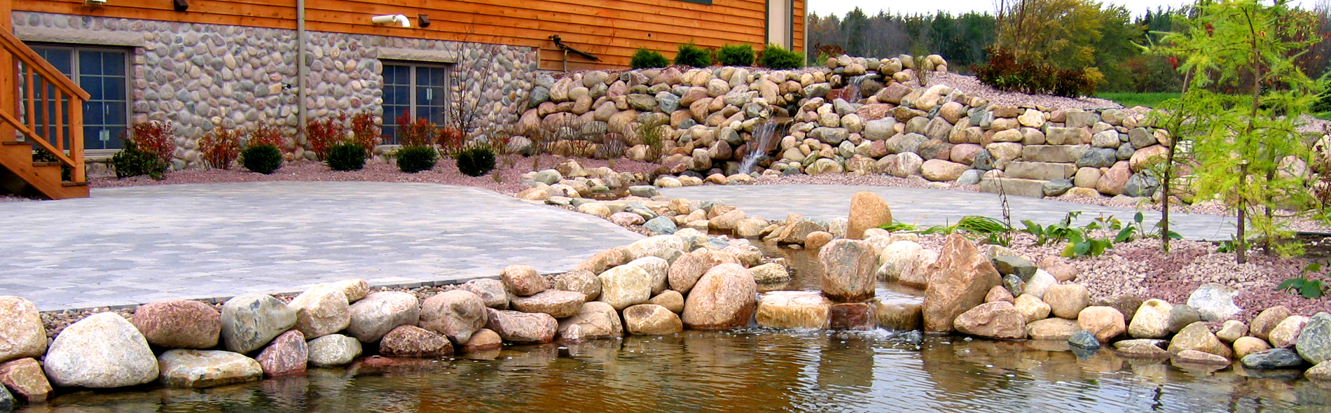 Patio with stream and pond
